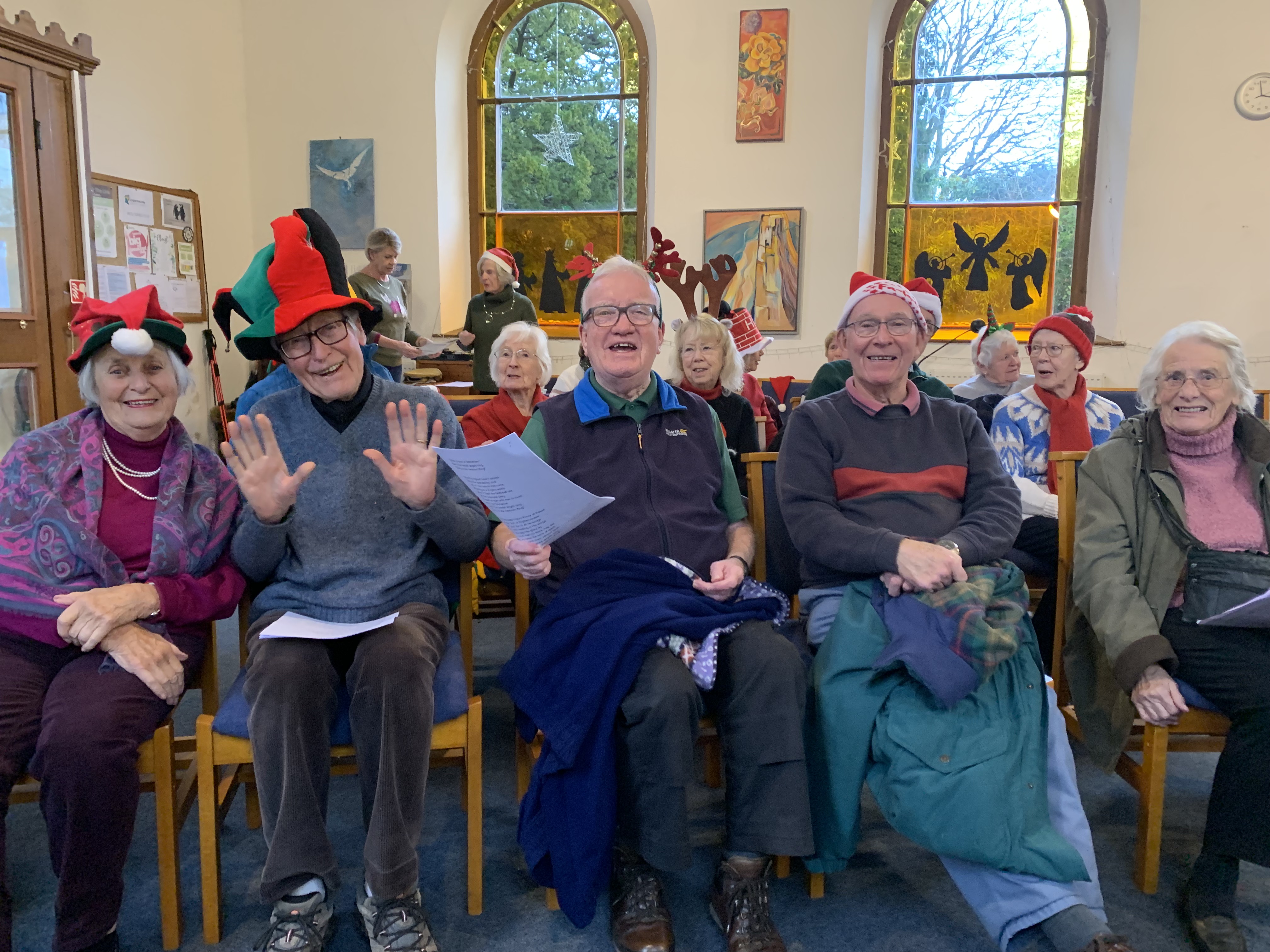 Christmas carols in the elf hats